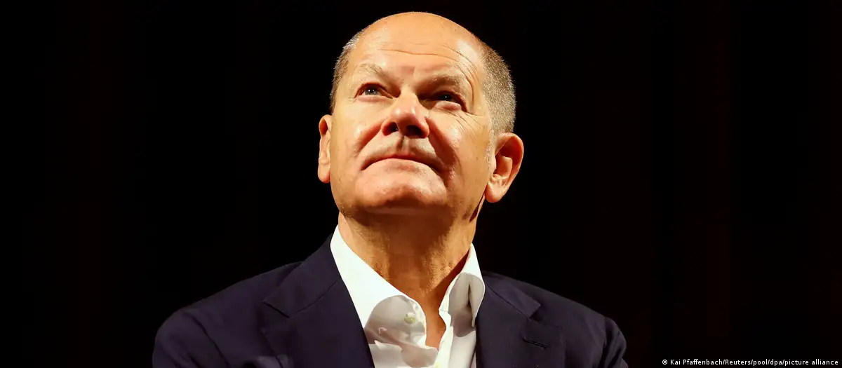 Germany's Scholz disrupted by protesters at Catholic event