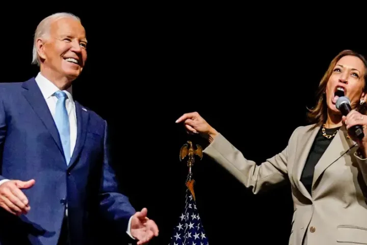 Biden, Harris hail lower Medicare drug prices and each other