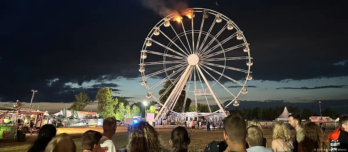 Ferris wheel fire started by 'material' under ride