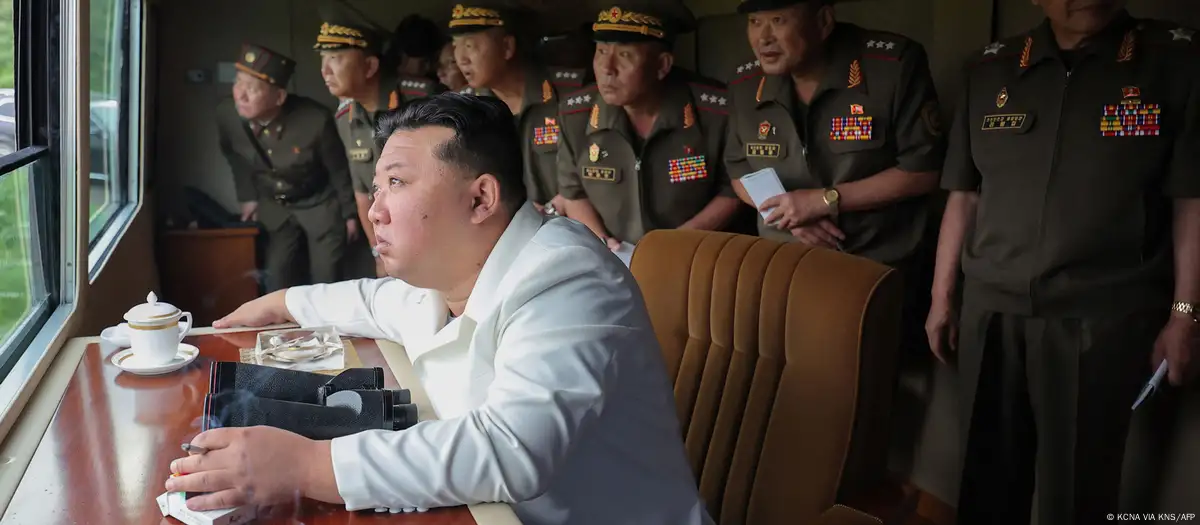 North Korea's Kim attends test-firing of new rocket launcher