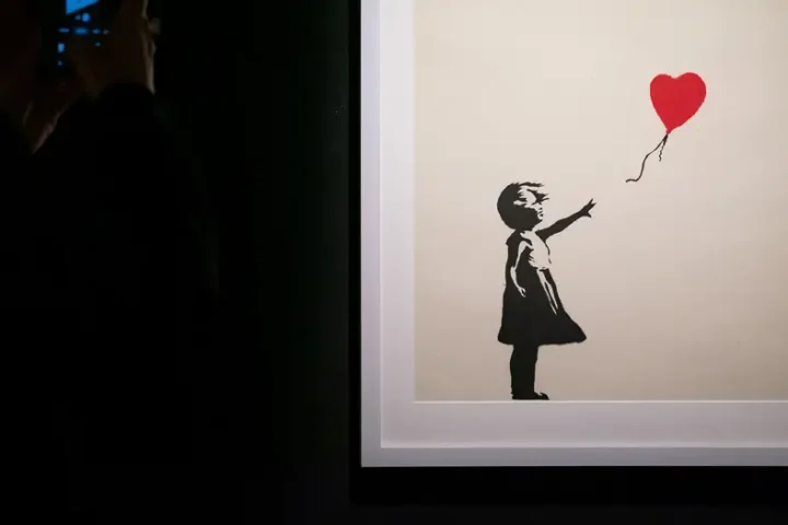 Banksy 'Girl with Balloon' art recovered, robbers charged