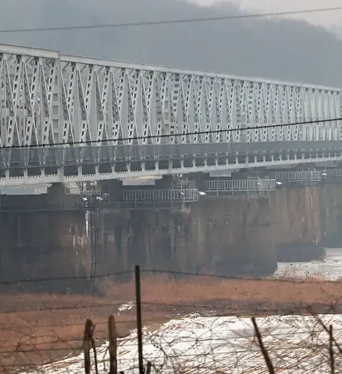 South Korea fires warning shots after North blows up roads