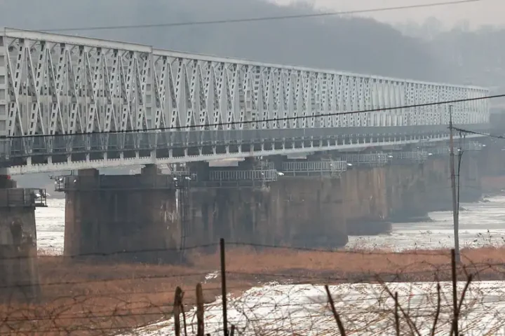 South Korea fires warning shots after North blows up roads