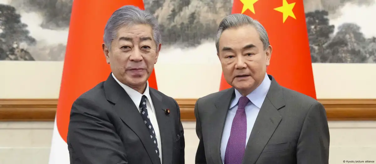 Japan FM visits China, seeking 'positive direction' for ties