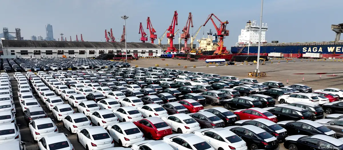 Chinese exports rise in December, beating expectations