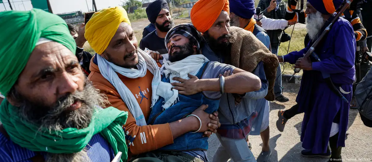 India detains protesting farmers, camps bulldozed