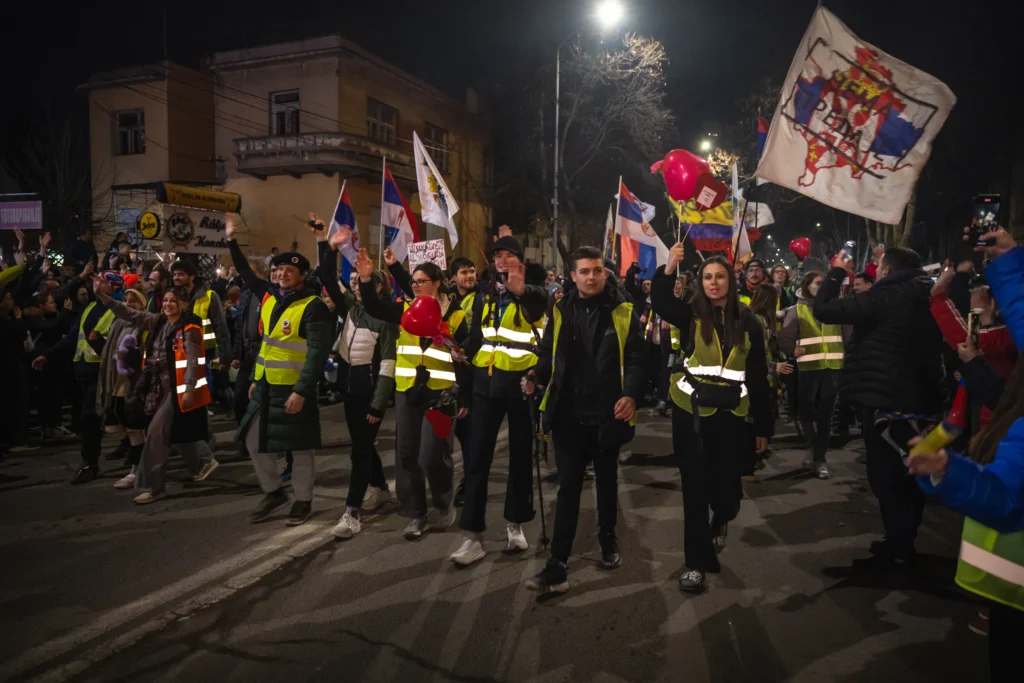 Serbian students arrive in Brussels after 2,000km ultramarathon for democracy