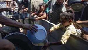 Humanitarian aid trucks enter Gaza from Egypt through Rafah during Israel’s tactical pause