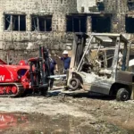 Rescue team finds body under rubble in Kyiv