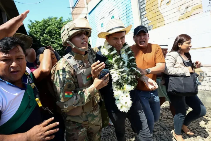 Mob attacks Bolivian presidential candidate Andrónico Rodríguez after he votes