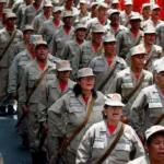 U.S. escalates pressure on Venezuela as citizens unite in national defense