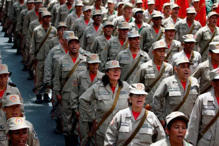 U.S. escalates pressure on Venezuela as citizens unite in national defense