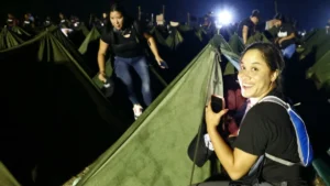 Venezuelan socialist youth hold night march for revolutionary training