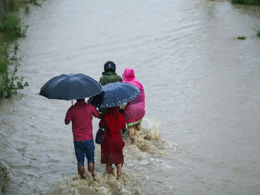 Nepalese flood victims return home as waters continue to recede