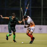 Players from India and Pakistan shake hands before Sultan of Johor Cup match, ending handshake ban