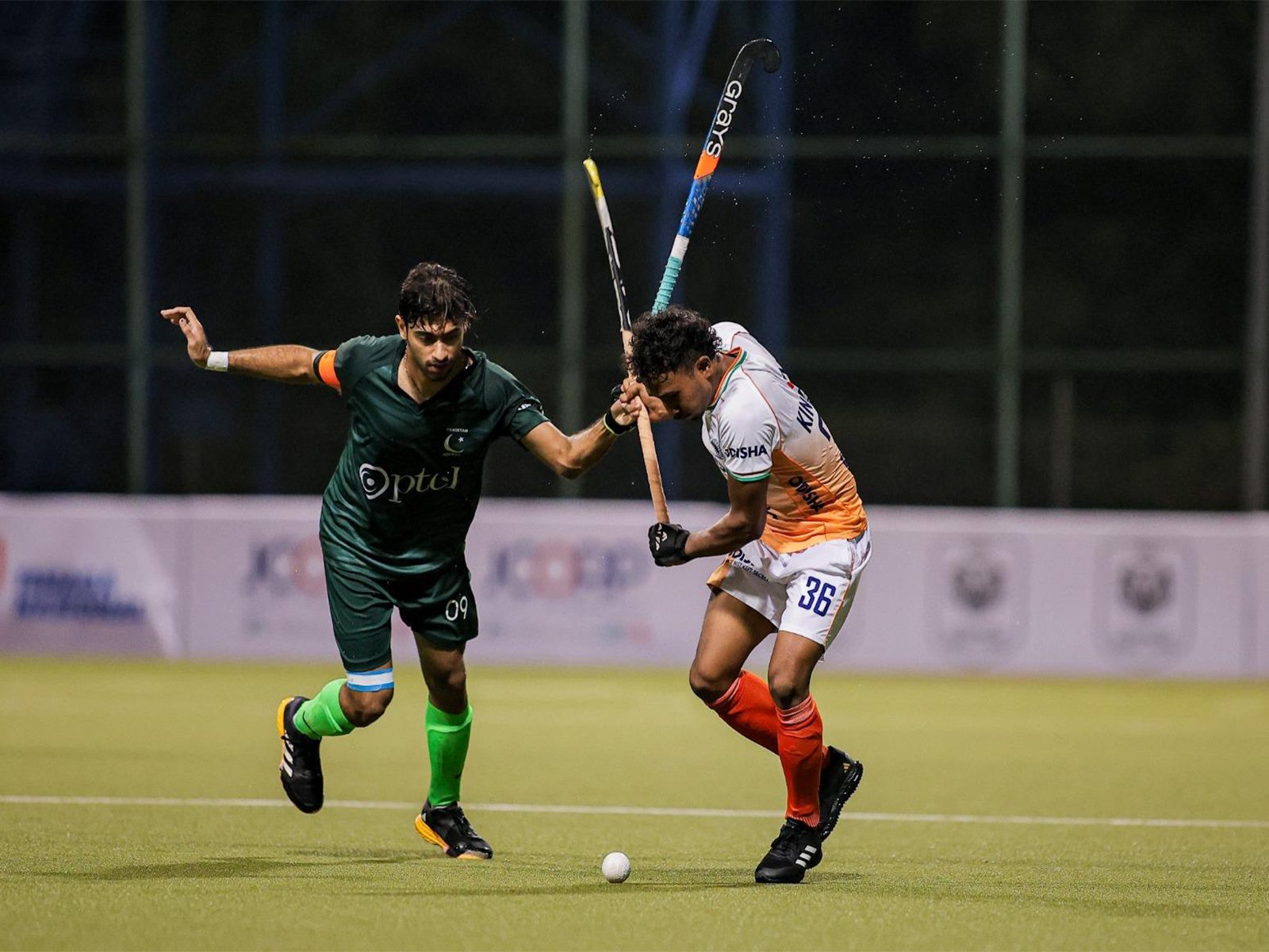 Players from India and Pakistan shake hands before Sultan of Johor Cup match, ending handshake ban